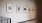 a wall with pictures on it