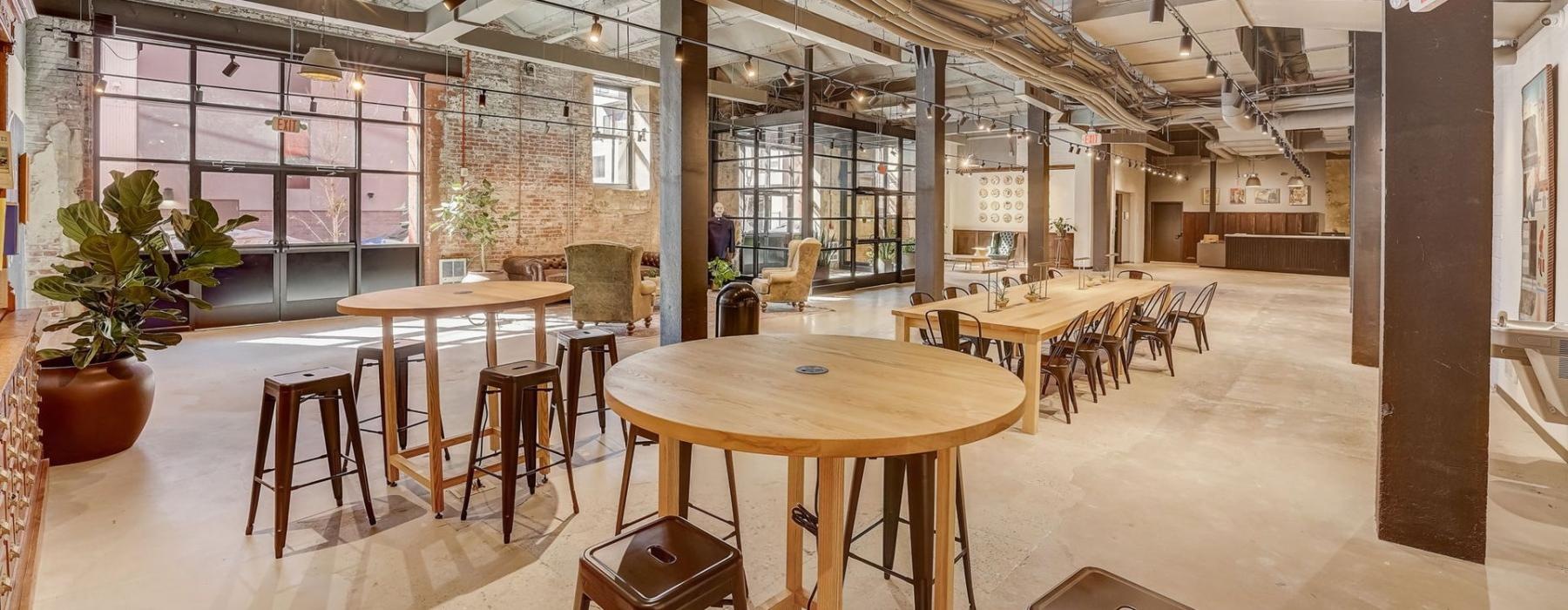 a large room with tables and chairs